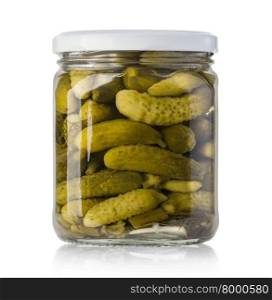 Pickled cucumbers in glass jar on a white background with clipping path