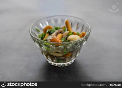 pickled honey mushrooms in a glass plate