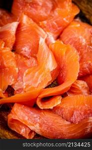 Pickled salmon fillet. Macro background. High quality photo. Pickled salmon fillet. Macro background.