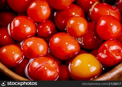 Pickled tomatoes in brine. Macro background. High quality photo. Pickled tomatoes in brine. Macro background.