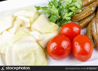 pickled vegetables of tomato, cucumber, cabbage