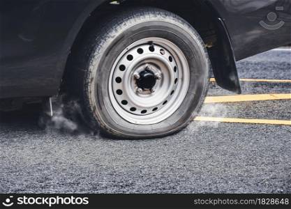 Pickup truck flat tire on the asphalt road