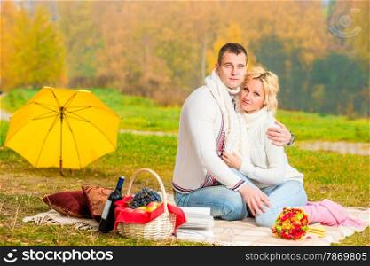 picnic autumn day. happy couple relaxing