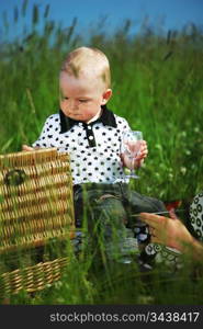 picnic of happy family on green grass