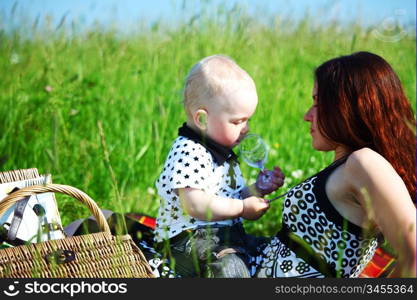 picnic of happy family on green grass