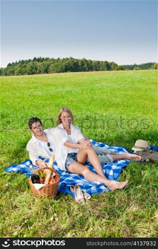 Picnic - Romantic happy couple in meadows nature sunny day