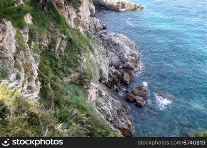 Pictorial blue Adriatic sea with rocks