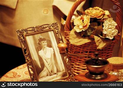 picture frame and basket of flowers