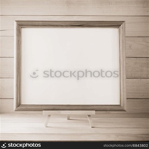 picture frame on wood. picture frame on wooden background