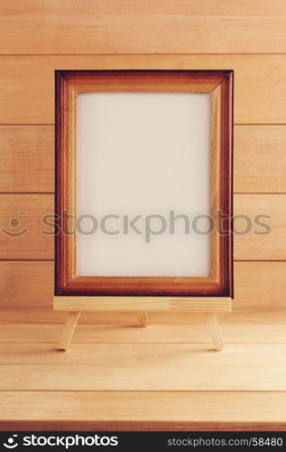 picture frame on wooden background