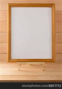 picture frame on wooden background