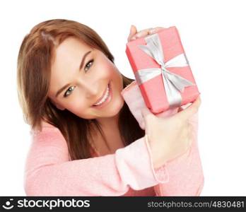 Picture of a happy young adult girl with gift box, cheerful female isolated on white background, pretty woman portrait with romantic present, holiday celebrations concept