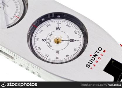Picture of a pocket size precision instrument combining compass and clinometer in tandem and case