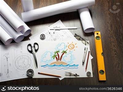 Picture of a tropical island on the table with tools