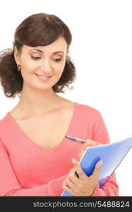 picture of a young attractive businesswoman with notebook