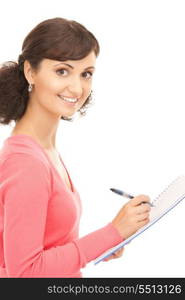 picture of a young attractive businesswoman with notebook