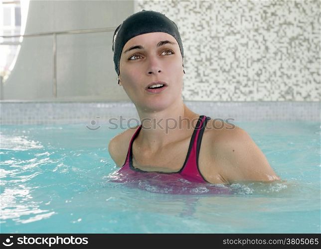picture of a young happy woman who swimming