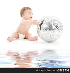 picture of adorable baby boy with big disco ball