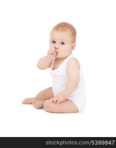 picture of adorable baby with finger in mouth