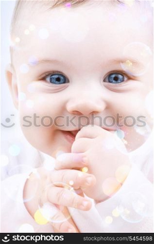 picture of adorable baby with soap bubbles