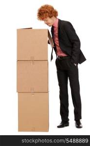 picture of attractive businessman with big boxes