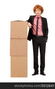 picture of attractive businessman with big boxes