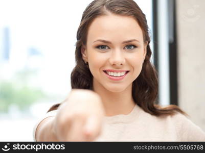 picture of attractive businesswoman pointing her finger