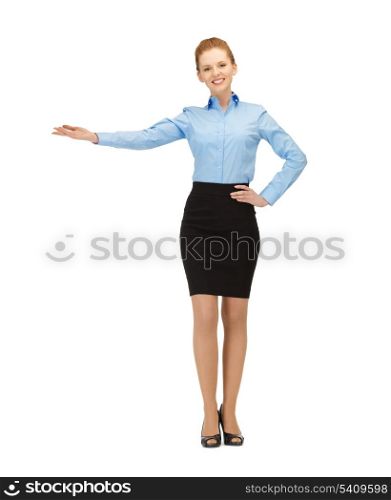 picture of attractive businesswoman showing something with her hand