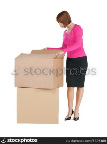 picture of attractive businesswoman with big boxes..