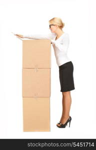 picture of attractive businesswoman with big boxes..