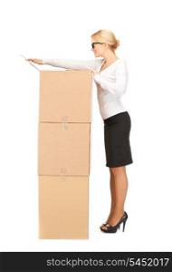 picture of attractive businesswoman with big boxes..