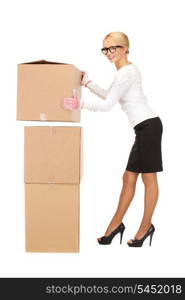 picture of attractive businesswoman with big boxes..