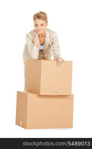 picture of attractive businesswoman with big boxes