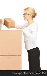 picture of attractive businesswoman with big boxes