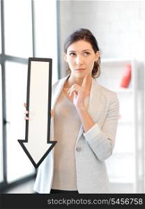 picture of attractive businesswoman with direction arrow sign