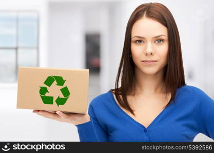 picture of attractive businesswoman with recyclable box