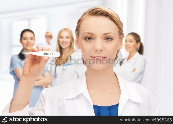 picture of attractive female doctor with thermometer