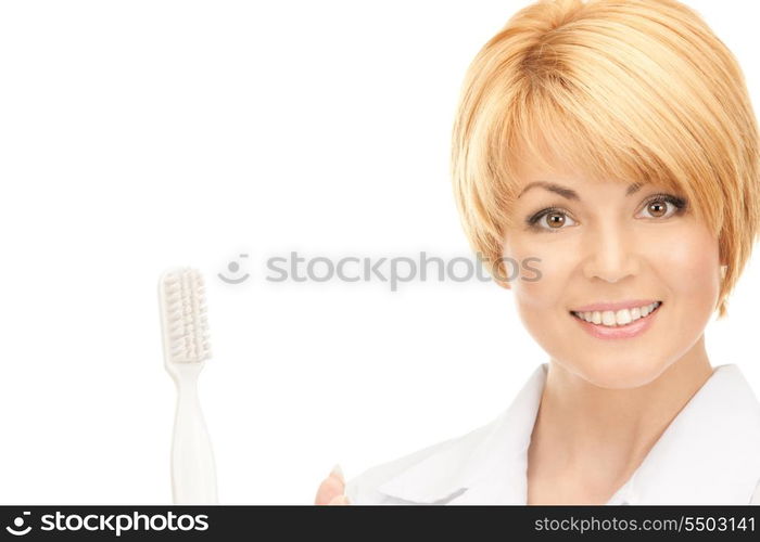 picture of attractive female doctor with toothbrush