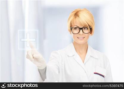 picture of attractive female doctor working with touchscreen