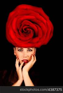 Picture of attractive female wearing stylish floral hat, fashionable accessories, portrait of pretty woman with great red rose on the head isolated on black background, Valentine day, love concept