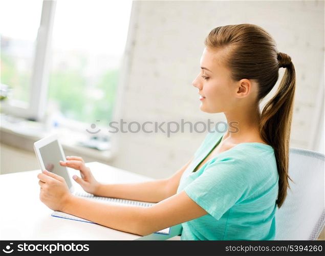 picture of attractive student girl using tablet pc