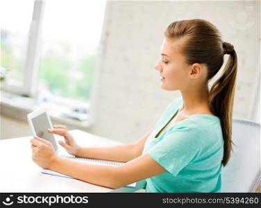picture of attractive student girl using tablet pc