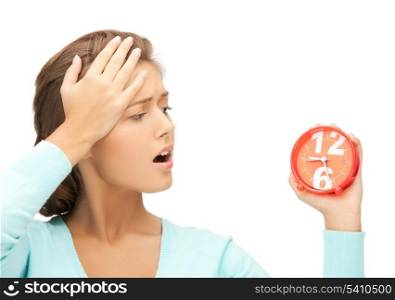 picture of attractive woman with alarm clock