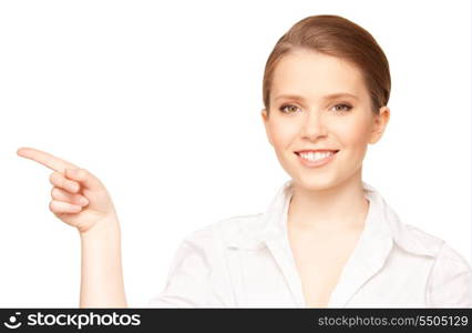 picture of attractive young businesswoman pointing her finger