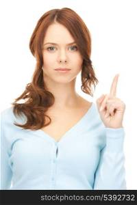 picture of attractive young woman with her finger up..