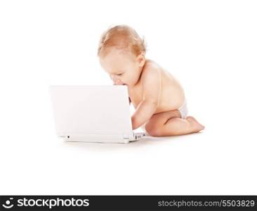 picture of baby boy in diaper with laptop computer