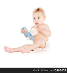 picture of baby boy with big pacifier over white