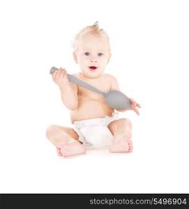 picture of baby boy with big spoon over white
