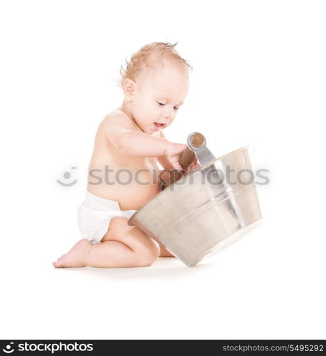 picture of baby boy with wash-tub over white