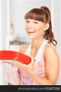 picture of beautiful cooking housewife at home